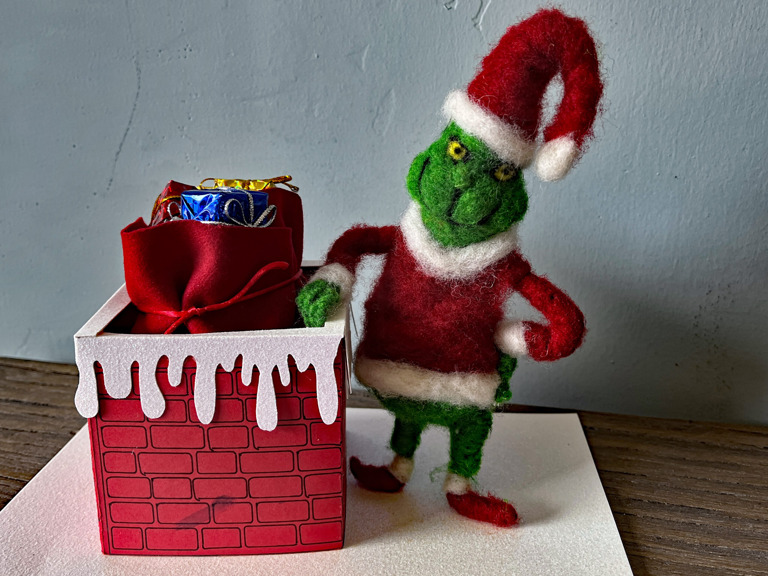 Grinch next to Chimney